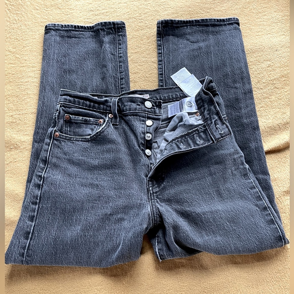 Levi’s by San Francisco California designers! Pre owed! Capital “E” size 27